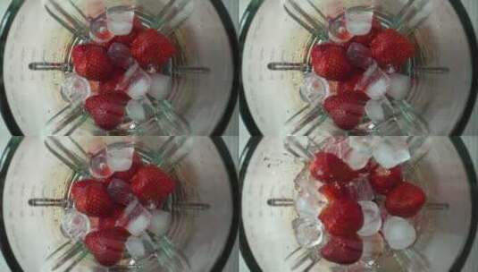 搅拌机里有草莓和冰块高清在线视频素材下载