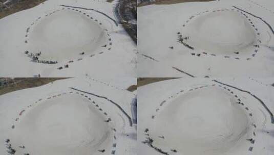 雪地上一个围起来的大圈玩雪地车DLOG高清在线视频素材下载