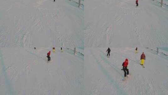 滑雪爱好者在户外滑雪场滑雪高清在线视频素材下载