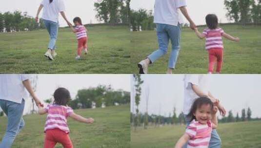小女孩和妈妈在一起公园奔跑高清在线视频素材下载
