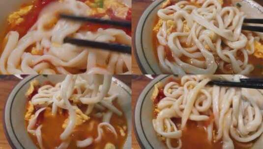 番茄激动面筷子搅拌慢动作高清在线视频素材下载