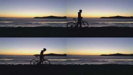 男子在海边骑行剪影高清在线视频素材下载