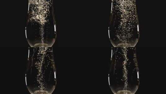 高脚杯中的香槟酒气泡升格高清在线视频素材下载