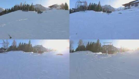 在雪山山峰和br的背景下，滑雪者从滑雪缆高清在线视频素材下载