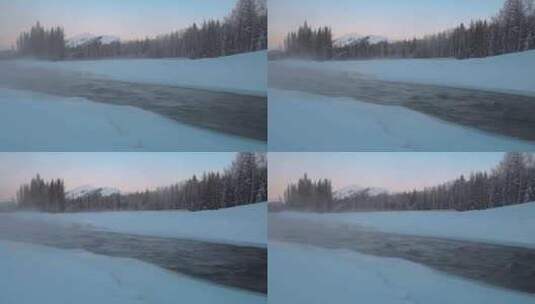 新疆阿勒泰冬季禾木河流淌水雾美景高清在线视频素材下载