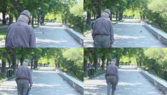 公园里散步的老人背影高清在线视频素材下载