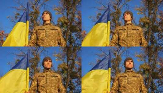 乌克兰军人在农村举着国旗对抗蓝天高清在线视频素材下载