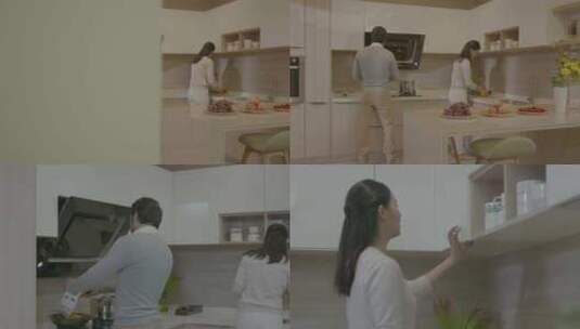 一家人在厨房烹饪温馨甜蜜高清在线视频素材下载