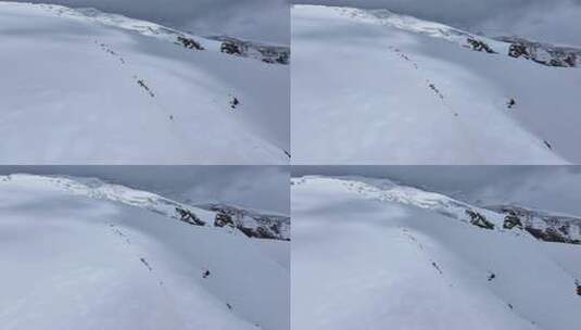 航拍攀登慕士塔格峰雪山冰川的登山队高清在线视频素材下载