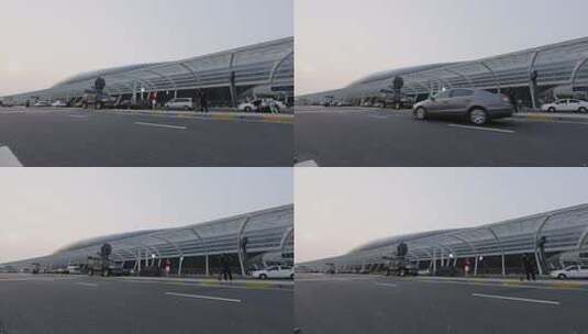 电视新闻记者在机场候机楼前做直播报道高清在线视频素材下载