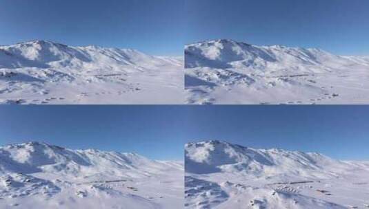 航拍新疆阿勒泰喀纳斯雪景白雪覆盖的雪山高清在线视频素材下载