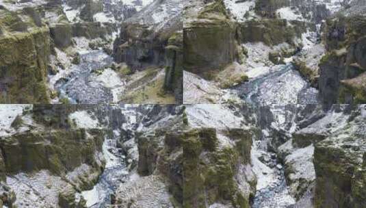 无人机穿过白雪皑皑的穆拉格朱富尔峡谷高清在线视频素材下载