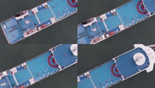 航拍俯瞰威海湾的侨乡号游轮高清在线视频素材下载