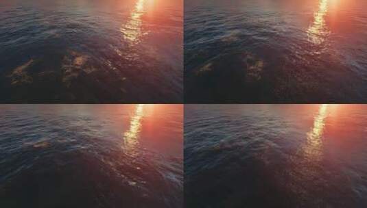 海面反射着夕阳的光辉高清在线视频素材下载