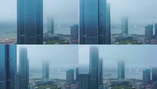 浓雾下的珠澳十字门横琴建筑高清在线视频素材下载
