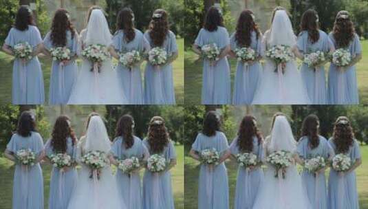 新娘和四名伴娘背过身举着花束高清在线视频素材下载