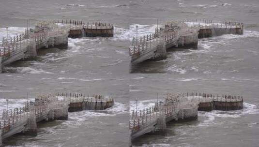 威海金海湾栈桥的冬季海浪高清在线视频素材下载