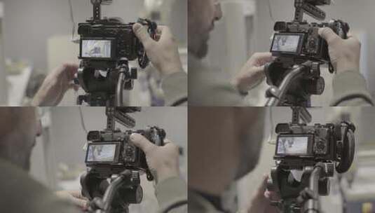 摄影师拍摄视频照片时手中的数码单反相机特写高清在线视频素材下载