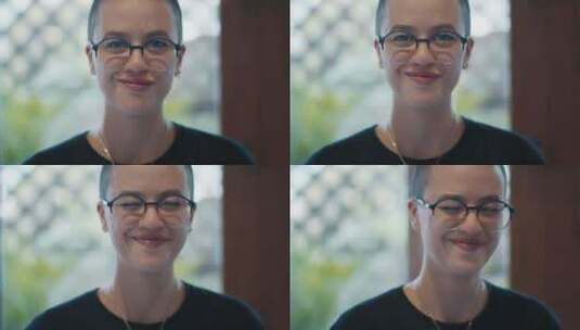 戴眼镜微笑的年轻女子高清在线视频素材下载