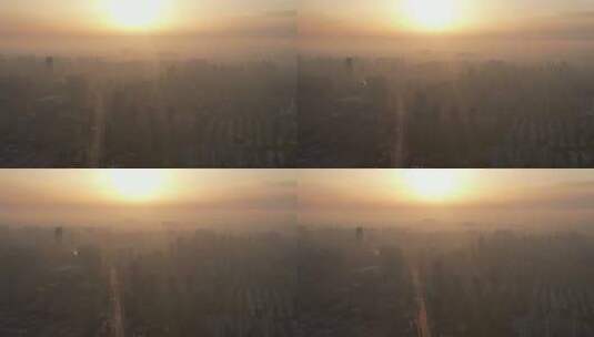 高楼迷雾清晨日出航拍高清在线视频素材下载