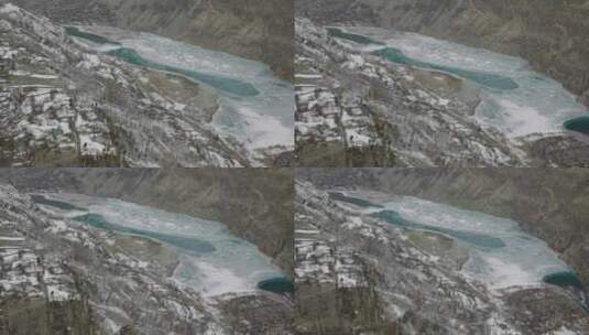 古皮斯-亚辛山谷冰冻的哈尔蒂湖的电影鸟瞰图。空中飞越冰冻的哈尔蒂高清在线视频素材下载