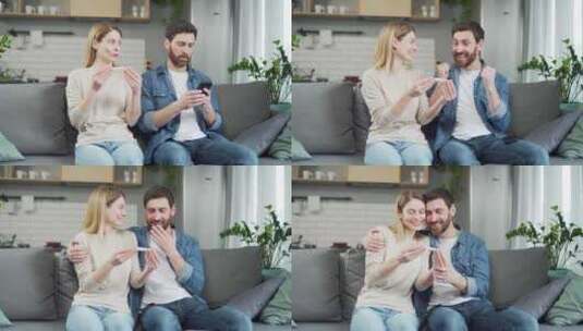 年轻微笑的女人向丈夫展示怀孕试验呈阳性，高清在线视频素材下载
