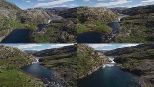空中拍摄，翱翔在挪威的一系列小湖和瀑布上高清在线视频素材下载