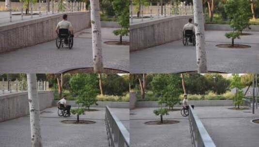 轮椅上的人在现代桥梁上使用户外平板电脑高清在线视频素材下载
