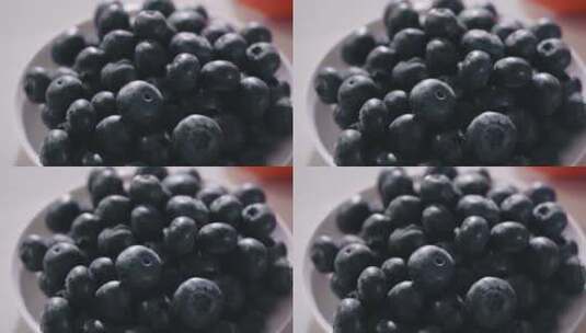 装在盘子里的蓝莓特写高清在线视频素材下载