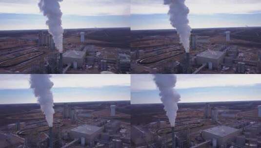 航拍炼油厂烟囱中冒出的滚滚浓烟高清在线视频素材下载