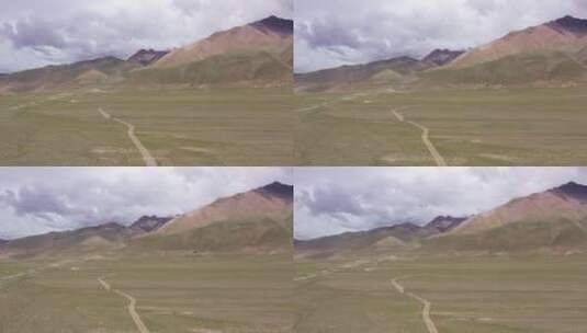西藏阿里一错再措当惹雍错骑摩托车机车旅行高清在线视频素材下载