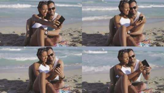 快乐夫妇在海滩上自拍高清在线视频素材下载