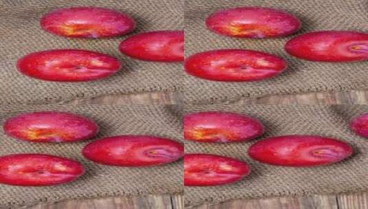 新鲜红李水果4k竖版实拍滑轨平移高清在线视频素材下载