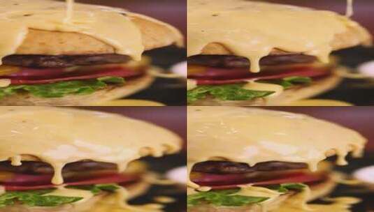 竖屏美食西餐汉堡淋芝士酱特写高清在线视频素材下载