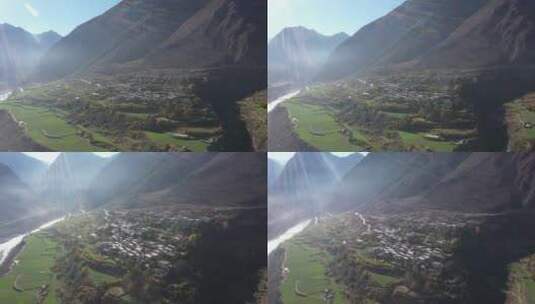 西藏219国道丙察察段村庄坐落在高山之下高清在线视频素材下载
