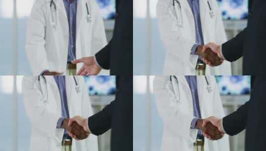医生在医院与一位商人握手1高清在线视频素材下载