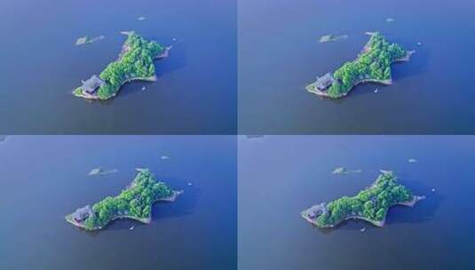 航拍蓝色湖中小岛高清在线视频素材下载