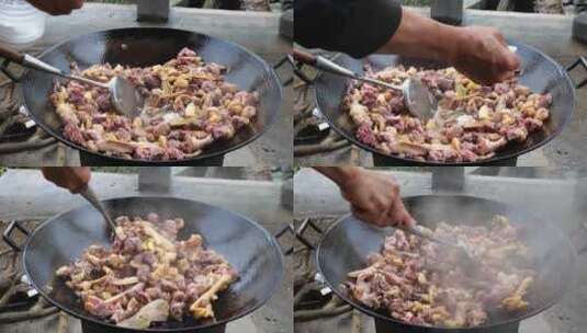 在农村生火烹饪鸭肉高清在线视频素材下载