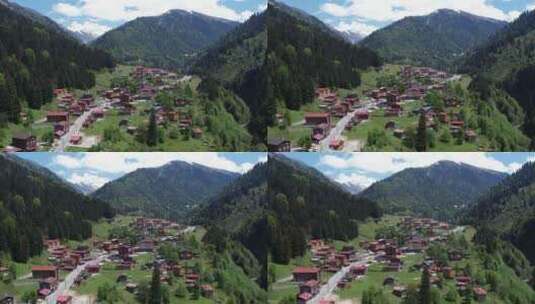鸟瞰山谷中的小村庄高清在线视频素材下载