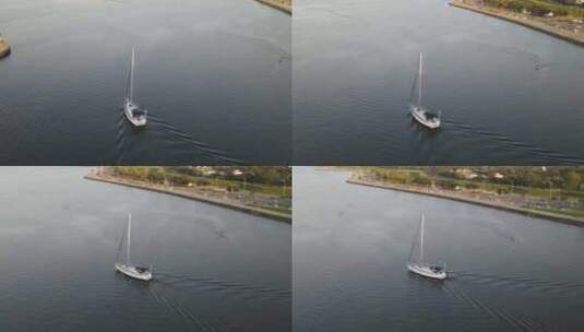美国路易斯安那州新奥尔良庞恰特雷恩湖帆船赛结束后，游艇返回港口高清在线视频素材下载