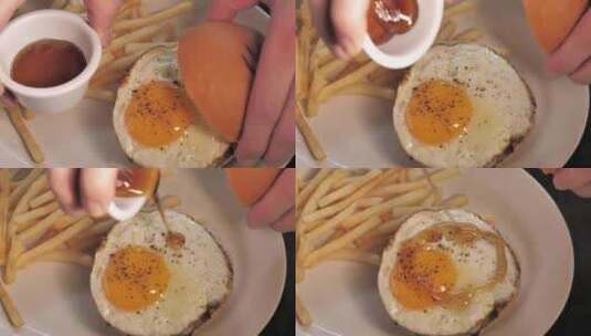 汉堡 食物 快餐 薯条 芝士汉堡 鸡蛋高清在线视频素材下载