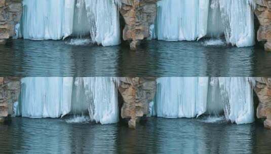 冬季湖面瀑布结冰与泉水高清在线视频素材下载
