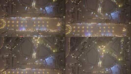 中国黑龙江哈尔滨世界欢乐城夜晚雪景航拍高清在线视频素材下载