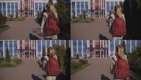 可爱的女生走向学校大楼高清在线视频素材下载