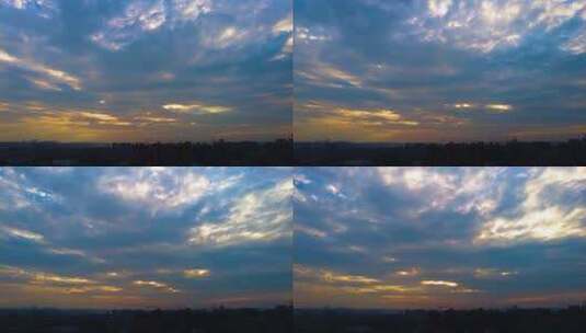 城市傍晚阳光穿过云层延时摄影高清在线视频素材下载
