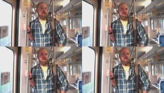 背着背包乘坐地铁车厢的城市居民一个成年人高清在线视频素材下载