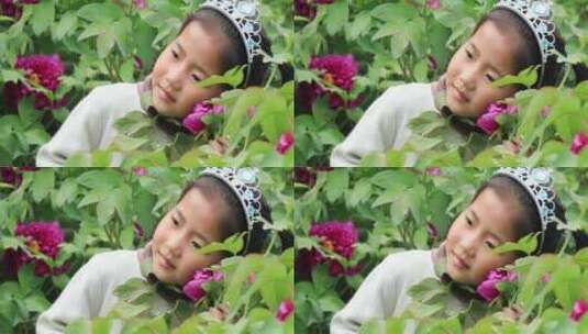 牡丹花丛中的可爱女孩 赏花闻花玩耍笑容高清在线视频素材下载