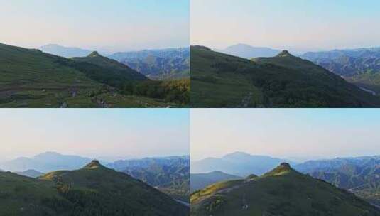 夏季高山草甸绿色森林牧场夕阳航拍高清在线视频素材下载