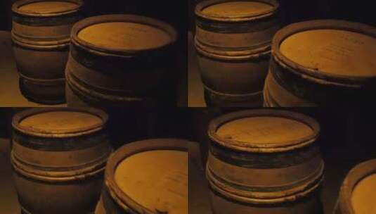 酿酒地窖里的酒桶地窖里的红葡萄酒桶酒窖酿高清在线视频素材下载