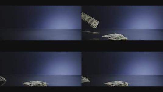 钞票飘落在桌上的特写高清在线视频素材下载